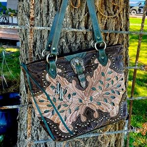 American West tooled leather tote.